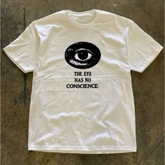 The Eye Has No Conscience T-Shirt Fast Shipping $25 Lowest I Can Do Custom Deadstock Hit Me With Questions Dtf Shirt Design, Retro T Shirts Vintage, T Shirt Back Design, Cool Tshirt Designs Graphic Tees, Black Graphic Tee, Dice Shirt, Punk Style T-shirt With Funny Print For Streetwear, White Punk T-shirt With Graphic Print, Eye Graphic Shirt