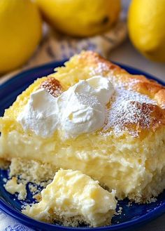 a slice of lemon pie on a blue plate