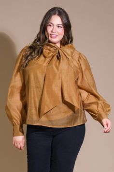 A solid organza top featuring front bow tie, long blouson sleeve with cuff and cami Details: Self : 100% PolyesterLining : 100% Polyester Size & Fit - Model is 5`8" And Wearing Size Small- Measurements Taken From Size Small- Approx. Length: 23.5" Organza Top, Blouson Sleeve, Flying Tomato, Solid Tops, Outfit Details, Bow Tie, Camel, Fitness Models, Womens Shirts