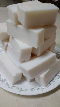 a pile of white soap sitting on top of a plate