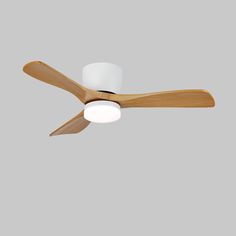 a white ceiling fan with two wooden blades and three light bulbs on the top of it