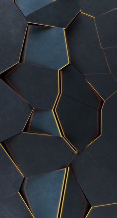 an abstract black and gold background with hexagonal shapes