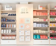 the inside of a store filled with lots of shelves and boxes full of different types of items