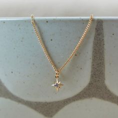 When you feel lost, remember the north star. This necklace and pendant will help you find your way and orient yourself. With its gold and cubic zirconia design, this accessory is the perfect addition to your outfit. Color: Gold Size: 14" + 3" Extender Material: 18K Gold Bonded - Cubic Zirconia Origin: Made in the U.S. North Star Pendant, Gold Star Necklace, When You Feel Lost, North Star Necklace, Feel Lost, Star Necklace Gold, The North Star, Find Your Way, Gold Bond