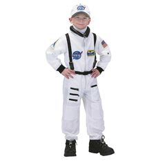 a young boy in an astronaut costume standing with his hands on his hips and looking at the camera