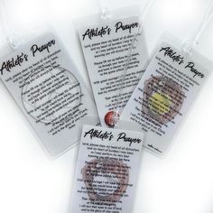 three bookmarks with the names of authors written on them