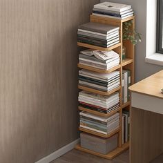 a book shelf filled with books next to a window