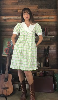 This adorable 1960's Baby Doll Wrap Dress is made from a beautiful soft white, green and pink seersucker fabric.  It features a large white Peter Pan collar, pretty puff cuffed short sleeves and an empire waistline with pockets on the skirt. The simplicity of this wrap dress design makes it light, easy wearing and flattering for many body types. It is in very good vintage condition. Measurements:  Length:  36" or 91.5cm Bust:  31" or 78cm Waist: Empire: 32" or 81cm Hips:  54" or 137cm Sleeve:  10" or 25cm All items are sold in laundered good or very good vintage condition.  Please check measurements and photos carefully and contact me with any questions. Baby Doll Dress For Women, 1960s Baby Doll Dress, 1960s Babydoll Dress, Fitted Cotton Vintage Dress With Doll Collar, Vintage Baby Doll Pajamas, Pink Seersucker, Vintage Doll Collar Dress-up Dresses, Empire Waistline, Cuffed Shorts