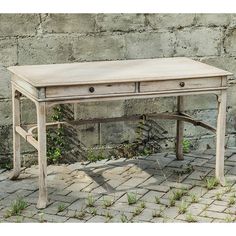 an old wooden desk with two drawers on the top and one drawer at the bottom