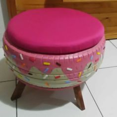 a pink stool with sprinkles on it