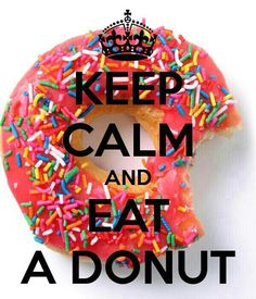 a donut with sprinkles and a crown on it that says keep calm and eat a donut