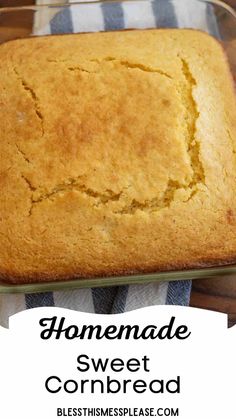 a loaf of homemade sweet cornbread in a glass dish on a blue and white towel