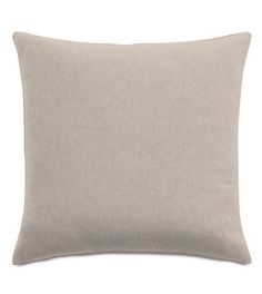 a light gray pillow on a white background