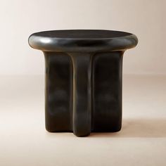 Bodene Round Black Resin Side Table + Reviews | CB2 Resin Side Table, White Marble Side Table, Coffee Table Stand, Leather Daybed, Gray Dining Chairs, Wood Accent Table, Marble Side Tables, Black Side Table, Metal Side Table