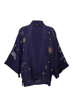 Our bestselling kimono jackets have Japanese inspired wide sleeves. They are fully lined so a good weight for wearing out of the  house over dresses or with jeans to add style with ease to any outfit! This navy blue kimono features gold and ivory cosmos embroidery. The stars, the heavens and mythical beasts are playfully embroidered on this stunning kimono that is a piece of wearable art. The outer fabric and lining are 100% Viscose.  Dry clean only. Cosmos Embroidery, Navy Blue Kimono, Blue Cosmos, Ceremonial Clothing, Mythical Beasts, Blue Kimono, Casual Kimono, Short Kimono, The Heavens