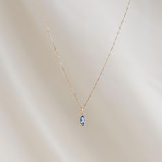 Our December Birthstone Pendant features a marquise-cut tanzanite gemstone set in 14k gold. 

Loop onto your favorite necklaces for a personal touch. 


Perfect as a meaningful gift to yourself or a loved one born in December. 


Tanzanite is the stone of transformation

Marquise gemstone measuring at 3mm x 6mm

Inner length of bail measures at 3.4mm

14k yellow gold setting

Chain is sold separately Tanzanite Gold Jewelry, December Birth Stones, December Jewelry, December Birthstone Necklace, Born In December, December Birthstone Jewelry, Tanzanite Necklace, Preppy Jewelry, Tanzanite Jewelry