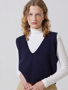 Composition : Wool 100%Color : NavyCountry of Origin : Republic of Korea Blue V-neck Sweater Vest For Fall, Elegant Blue V-neck Vest, V-neck Knit Vest For Work, Chic V-neck Fine Knit Tank Top, Blue Knit V-neck Vest, Blue V-neck Sweater For Layering, Fall Navy V-neck Tops, Blue V-neck Sweater Vest For Winter, Blue V-neck Tank Top For Fall