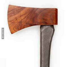 a wooden handle on top of a metal blade