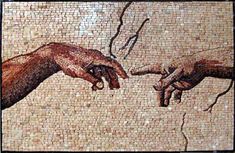 two hands touching each other on a mosaic