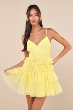 An attention-worthy look like the Lulus Special Poise Yellow Tulle Pleated Sleeveless Tiered Mini Dress will have everyone in awe all night long! Layers of sheer tulle mesh shape this iconic dress that features a pleated, sleeveless bodice, a flirty V-neckline, and adjustable spaghetti straps. A flattering, set-in waist sits atop a flouncy, tiered skirt that finishes at an alluring mini hem. Hidden back zipper/clasp. Fit: This garment fits true to size. Length: Mid-thigh. Size medium measures 26 Yellow Fringe Dress, Loose Fitting Hoco Dresses, Yellow Short Formal Dress, Chiffon Homecoming Dress, Fluffy Hoco Dresses, Sleeveless Tulle Skirt Dress For Night Out, Elegant Sleeveless Mesh Dress For Summer, Elegant Sleeveless Summer Mesh Dress, Sleeveless Tulle Mini Dress For Evening