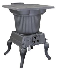 an old fashioned stove with a fan on it's top and legs, sitting in front of a white background