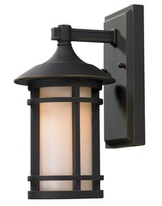 an outdoor wall light that is black and has a white glass shade on the top