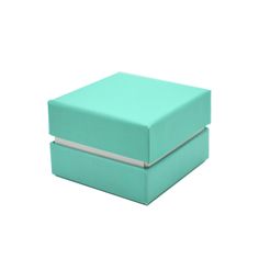 a green box with a lid on it