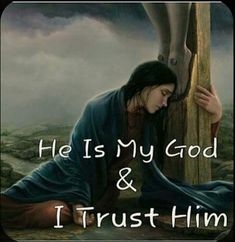 a woman kneeling down next to a cross with the words he is my god and i trust him