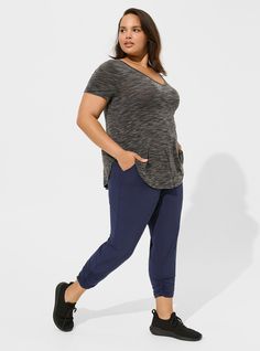 FIT Model is 5'10” wearing size 1. . Measures 30” from shoulder (size 2). MATERIALS + CARE Lyocell blend knit fabric. . 75% polyester, 19% lyocell, 6% spandex. Machine wash cold. Tumble dry low. Imported. DETAILS Crew neckline. . Short sleeves. . Shirttail hem. The best plus size women's lyocell v-neck short sleeve active tunic sport tops in deep black cloud dancer spacedye made of lyocel. This sporty athletic-wear is great for looking good while you are working out, being active, playing your f Athleisure Short Sleeve Yoga T-shirt, Casual Short Sleeve Yoga T-shirt, Elastane Short-sleeve Yoga Tops, Cotton Short Sleeve T-shirt For Yoga, Sportswear Yoga T-shirt Short Sleeve, Red Plum, Swimming Activities, Pilates Barre, Lifting Weights