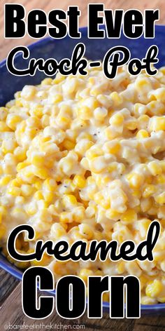 the best ever crock - pot creamed corn in a blue bowl on a wooden table