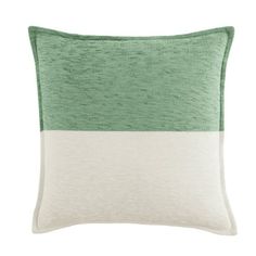 a green and white pillow on a white background