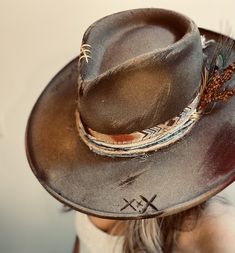 Our Custom Cowboy collection is where western meets your unique style - allow us to design a custom hat just for you! Featuring luxury 100% wool hats with stiff brims, simply choose your perfect base colour and personalized accents. Premium packaging is available for shipping to ensure your custom piece remains intact during transport. CURRENT STOCK INFO: Earthy Brown - 100% wool felt, stiffened wide flat brim to retain shape, and diamond shaped crown. Adjustable internal hat band up to 2cm for a tighter fit. Available in 57cm (M) sizing. Ivory White - 100% wool felt, stiffened wide flat brim to retain shape, and teardrop shaped crown. Adjustable internal hat band up to 2cm for a tighter fit. Available in 57cm (M) sizing.  **PLEASE NOTE:  *All Custom Cowboy hats are final sale as they are Mens Straw Cowboy Hat, Personalized Cowboy Hat, Custom Cowboy Hats Women, Custom Cowgirl Hats, Diy Leather Hat, Western Hat Styles, Burnt Hat, Western Hats For Women, Cowboy Hats Women