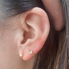 10k Solid Gold Tiny Butterfly Huggies Hoop Earring - Etsy Delicate Tiny Huggie Hoop Earrings, Pierced Hoop Ear Cuff As A Gift, Everyday Star Cartilage Earrings, Tiny Dainty Huggie Hoop Earrings, Dainty Tiny Huggie Hoop Earrings, Small Hoop Pierced Cartilage Earrings As Gift, Pierced Huggie Ear Cuff As Gift, Dainty Small Hoop Single Huggie Earring, Nickel-free Star-shaped Huggie Earrings