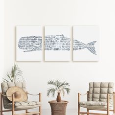 two chairs and a potted plant in front of three paintings