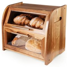 a wooden bread dispenser filled with fresh baked goods