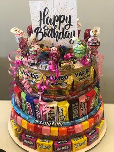 a birthday cake made out of candy bars