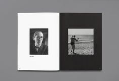 an open book with black and white photos on it, showing a man standing in front of the ocean