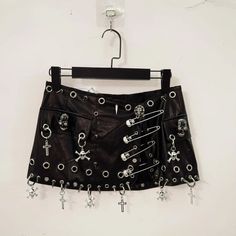 🌟 Edgy and Bold: Chained Skull Short Skirt

👗 Define Your Style with Attitude:

Make a statement with the Chained Skull Short Skirt, meticulously designed for those who want to infuse their wardrobe with a touch of rebellious flair. This skirt is a must-have for anyone looking to add a dose of edginess to their ensemble. Punk Skirt Diy, Edgy Clothes, Edgy Jeans, Pvc Skirt, Cottagecore Dark Academia, Punk Skirt, Cottagecore Dark, Define Your Style, Girl Grunge