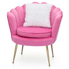 a pink chair with a white pillow sitting on it's back and gold legs