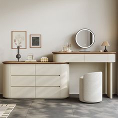 a bathroom with a vanity, mirror and stool next to a window in the room