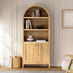 a wooden bookcase in the corner of a room