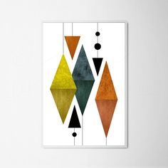 an art print with geometric shapes on the wall