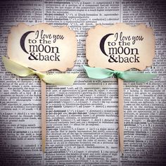 i love you to the moon and back lollipops with ribbon on them