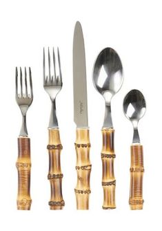 an assortment of knives, forks and spoons