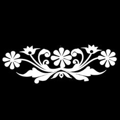 a white floral design on a black background