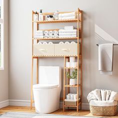 the bathroom is clean and ready for us to use it's own storage rack