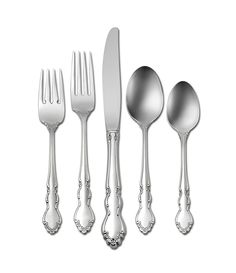 an assortment of silverware including forks, knives and spoons on a white background