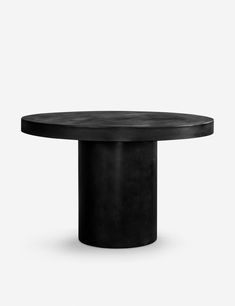 a black round table on a white background