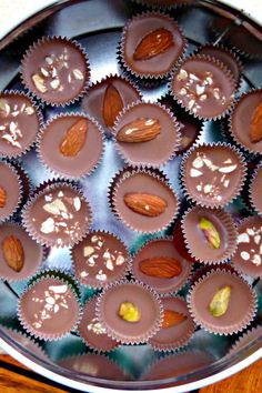 chocolates with almonds and pistachios in a metal pan