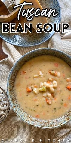 two bowls filled with soup on top of a table